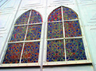 Stained glass windows adorn the church that Eiffel designed.  Bill Bell Photograph