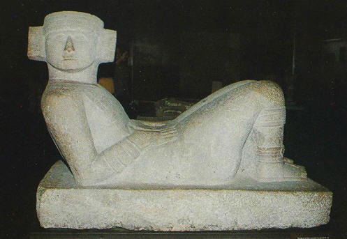 Chacmools are sculptures particular to pre-Columbian groups first appearing around the 9th century . They depict a human figure lying down in a particular pose.