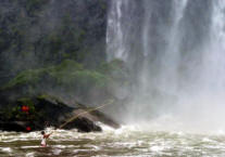 Fisherman under the waterfall near Catemaco
