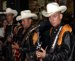 Banda musicians play for Christmas shoppers in La Paz Bill Bell Photogrpahy