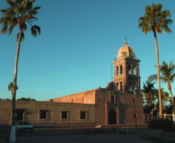 Sunset highlights the stone work of the Loreto Mission.  Bill Bell Photograph