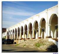 Some of the many arches surrounding the cathedral in Alamos