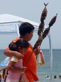 Los Ayalas brother and sister selling pescado Bill Bell Photograph