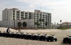 ATVs line the beach at Rosarito, a fun first stop on Highway 1 on the Baja California.  Bill Bell Photograph