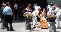 A little Cinderella gets a little direction from parents and freinds on th street of Puebla