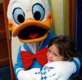 Donald duck hugs dylan Bell The World of Disney Photographs - Disneyland and Disneyworld by Bill And Dot Bell