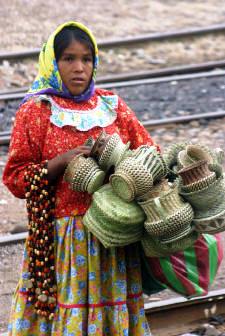 Seller of baskets outside of Copper Canyon Train...Bill Bell Photographer