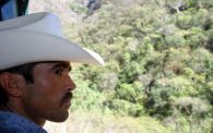 White hats on cowboys heading up into the Copper Canyon on the second class train