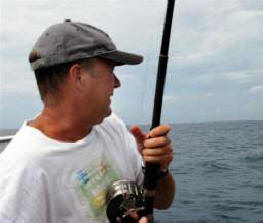 Frank reels the 31 ound dorado in