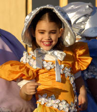Smiles all around during one Mazatalan's many Mardi Gras Parades..Bill Bell Photograp